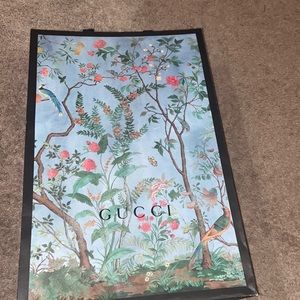 Gucci box and shopping bag
